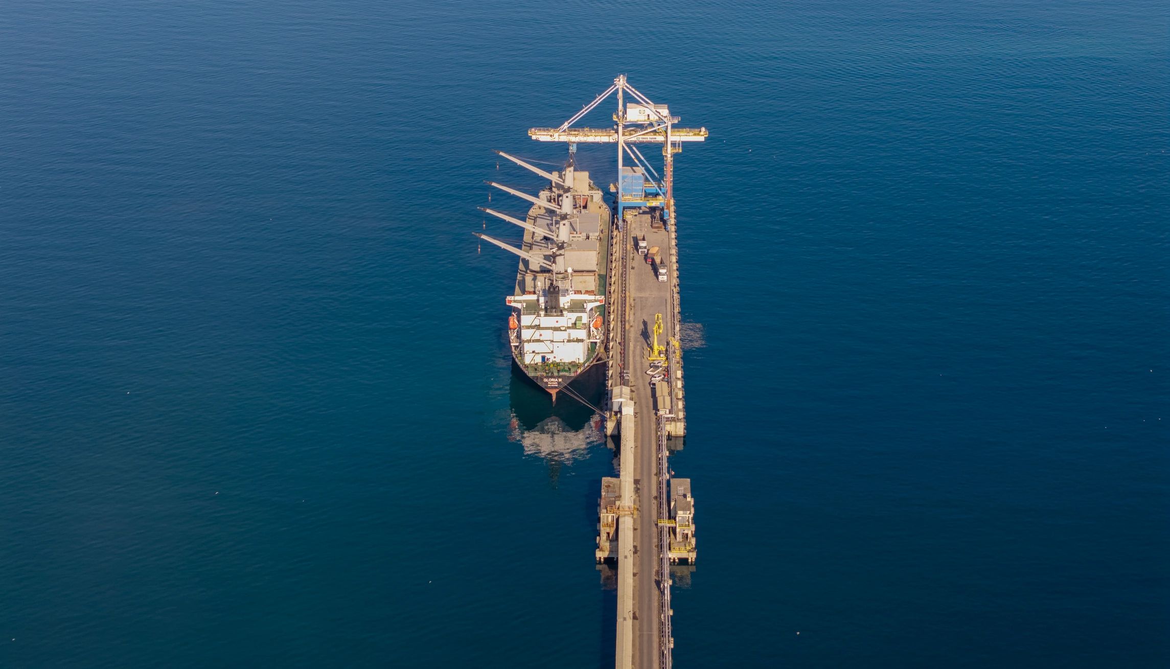 Cargo ship and logistics infrastructure representing cross-border trade